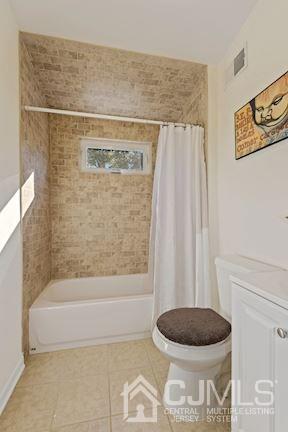 39 Morningside Road Colonia, NJ 07067 - Photo 17 of 30 a bathroom with a shower and a tub