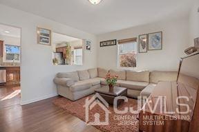 39 Morningside Road Colonia, NJ 07067 - Photo 18 of 30 a living room with furniture and wooden floor