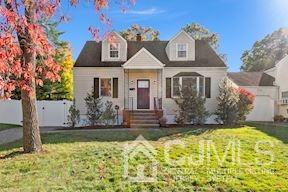 39 Morningside Road Colonia, NJ 07067 - Photo 3 of 30 a front view of a house with a yard