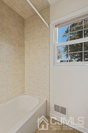 39 Morningside Road Colonia, NJ 07067 - Photo 21 of 30 a bathroom with bathtub and shower