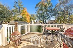 39 Morningside Road Colonia, NJ 07067 - Photo 5 of 30 a view of a chairs and table on the deck