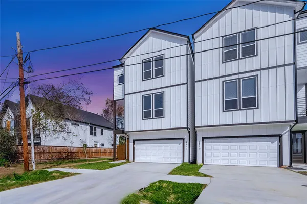 a house view with yard in front of it