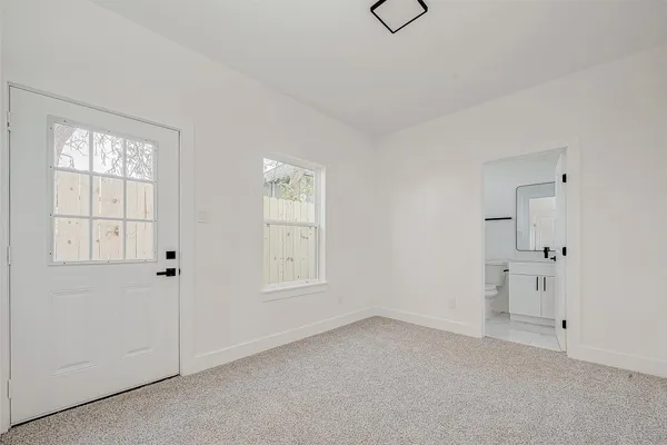 an empty room with windows