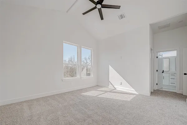 a bathroom with double vanity sink and mirror