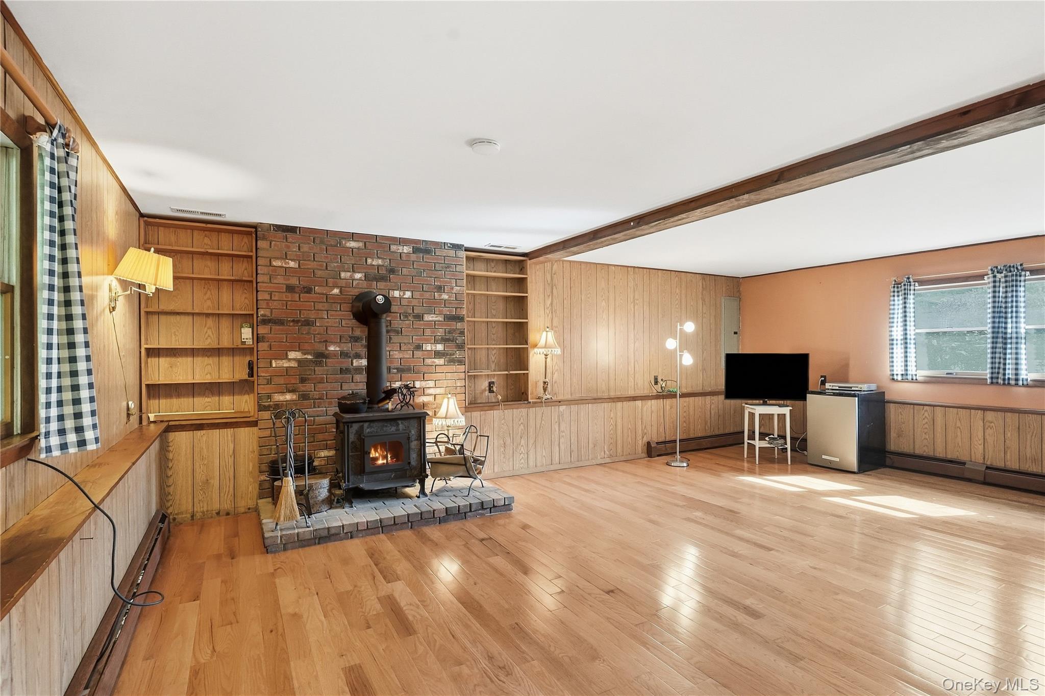 94 Booth Road Chester, NY 10918 - Photo 22 of 31 Wood stove on lower level