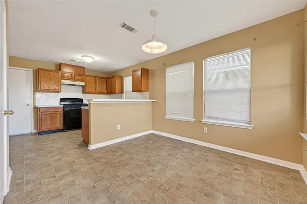 a view of a kitchen with a sink cabinets and a kitchen