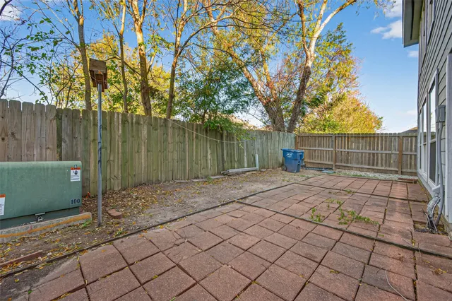 a view of backyard and entertaining space