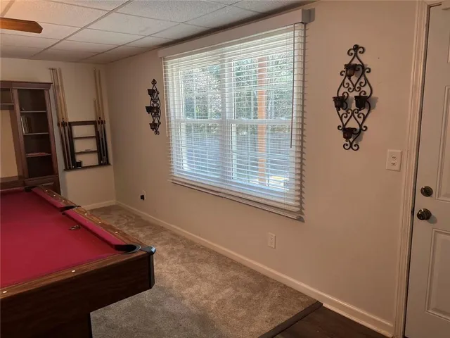 a room with furniture and a window