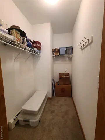 a view of balcony with couch and chairs