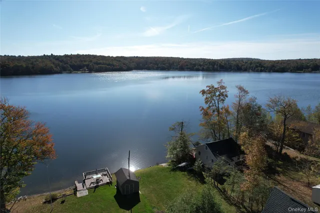 a kitchen with stainless steel appliances granite countertop a refrigerator stove and microwave