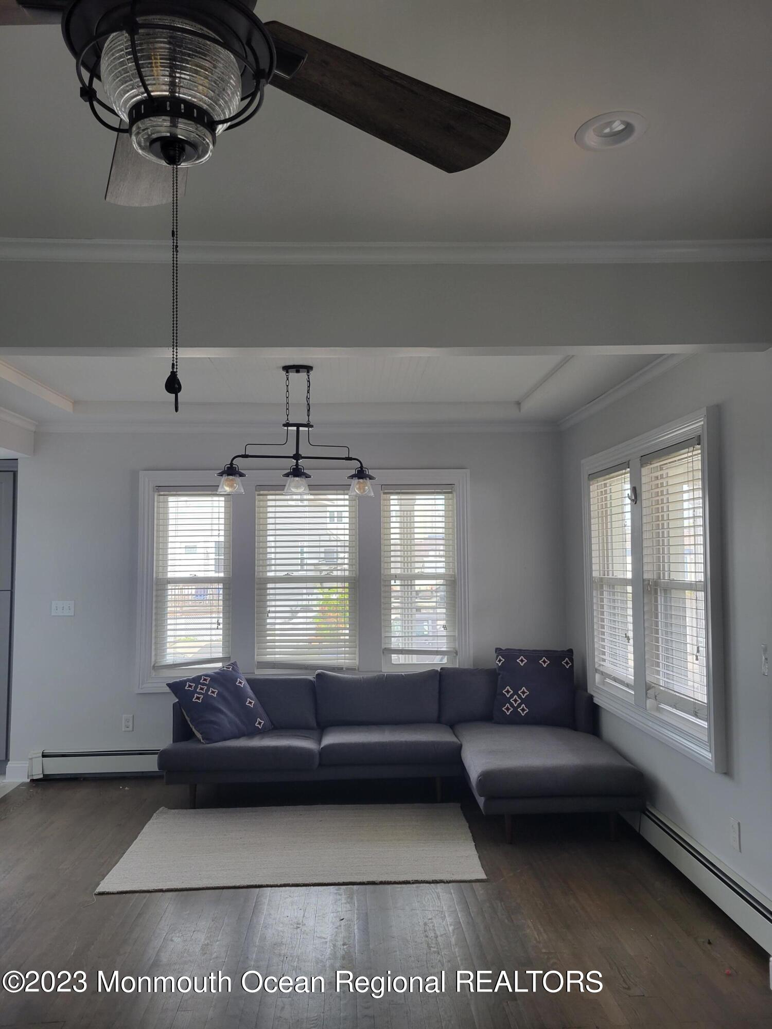 16 Cornwall Street Highlands, NJ 07732 - Photo 11 of 19 a living room with furniture and a window