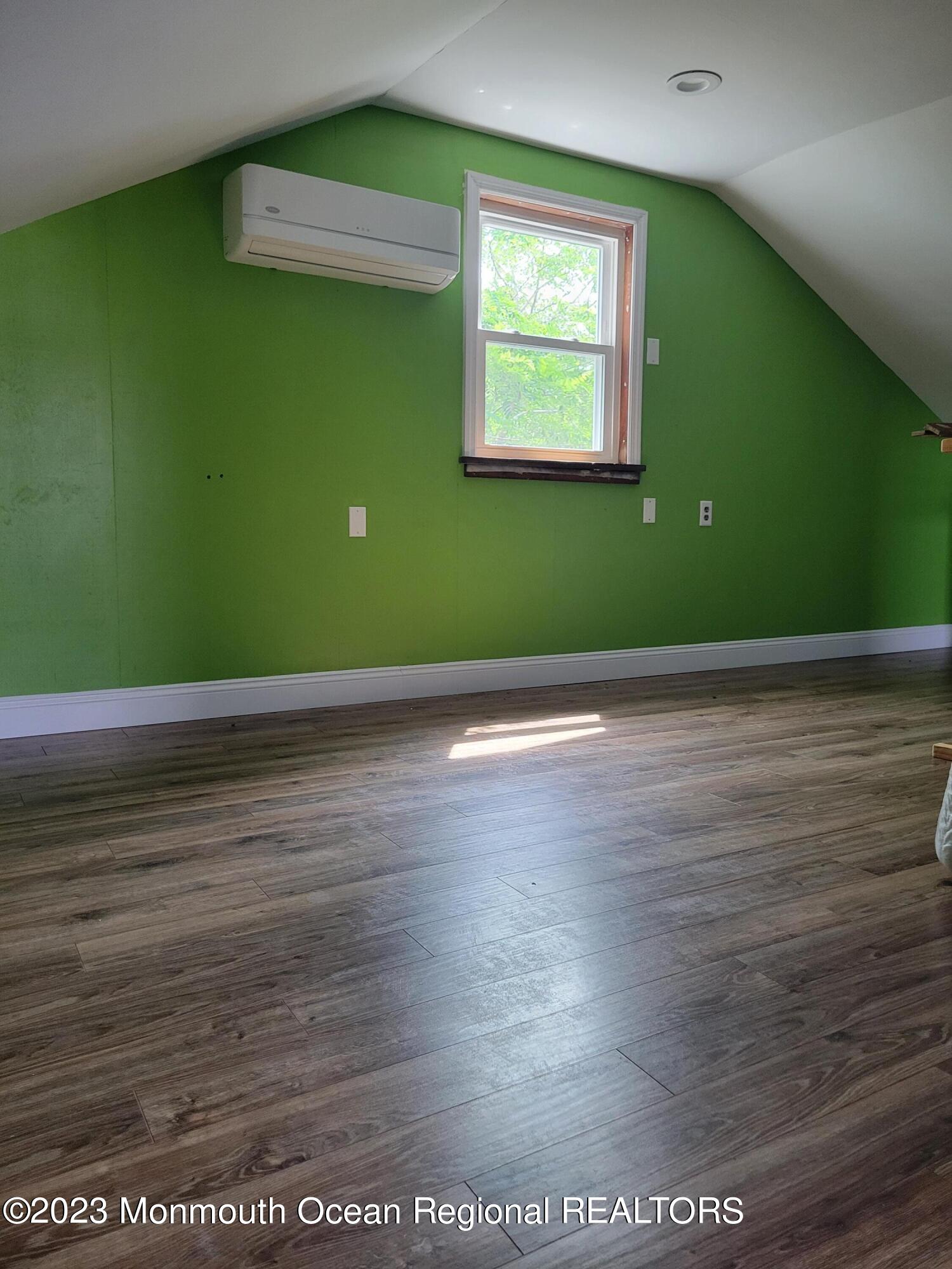 16 Cornwall Street Highlands, NJ 07732 - Photo 16 of 19 a view of a room with wooden floor