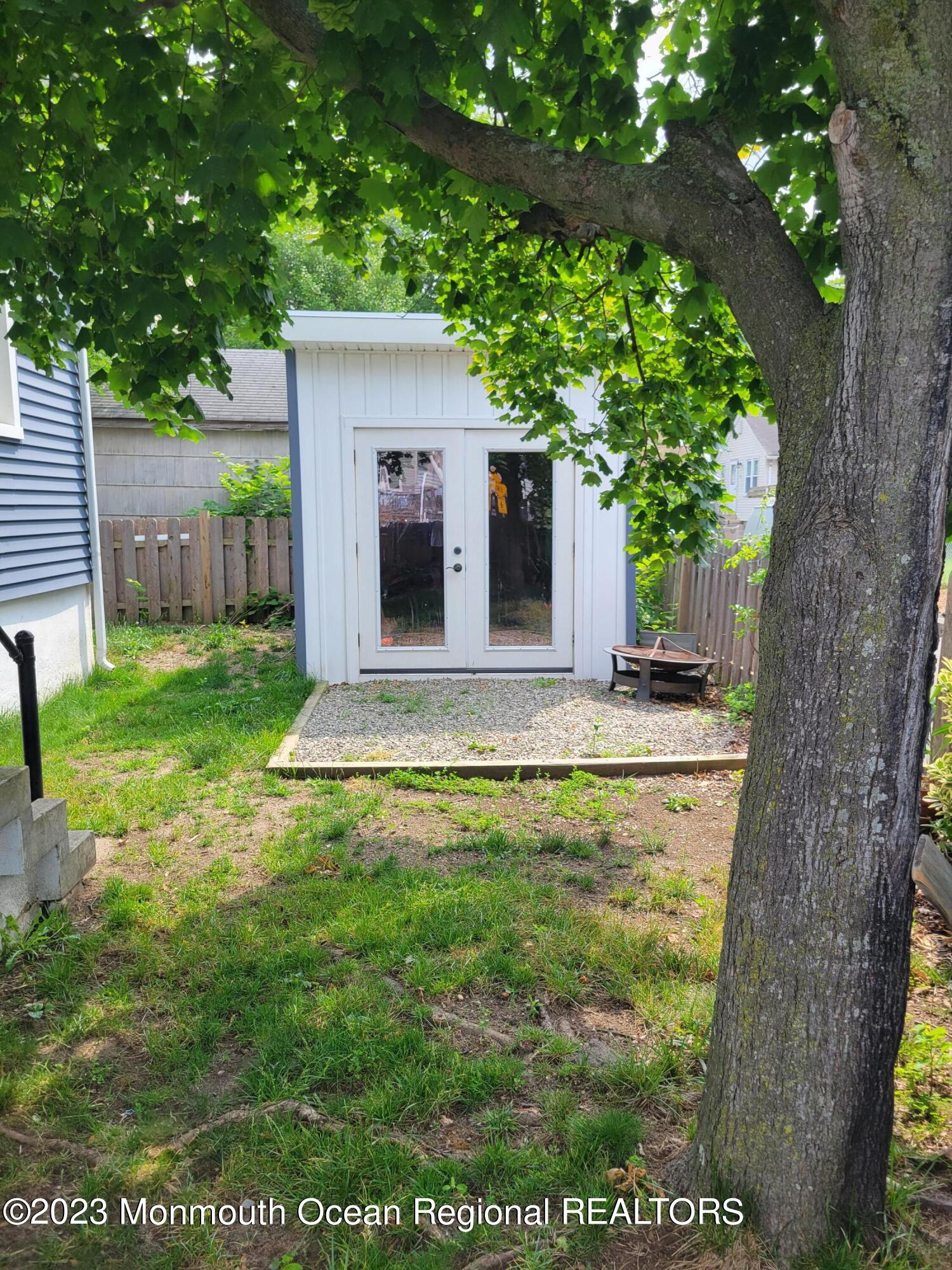 16 Cornwall Street Highlands, NJ 07732 - Photo 17 of 19 a view of a house with a yard