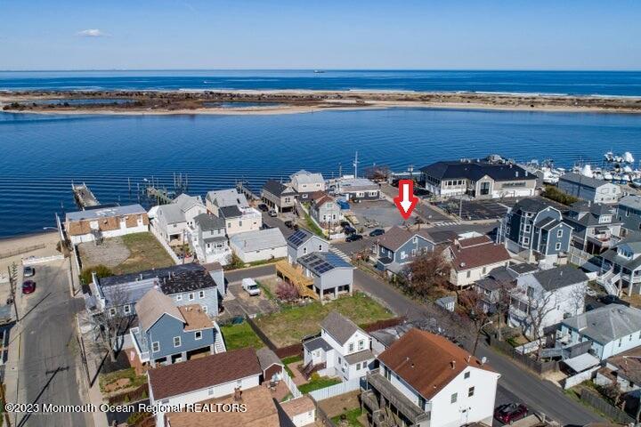 16 Cornwall Street Highlands, NJ 07732 - Photo 9 of 19 an aerial view of a houses with ocean view