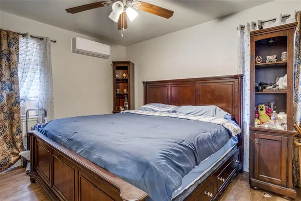 a bedroom with a bed and closet