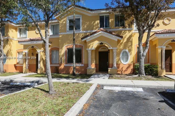 2911 Southeast 15th Road, Unit 65 Homestead, FL 33035 - Photo 1 of 11 a front view of a house