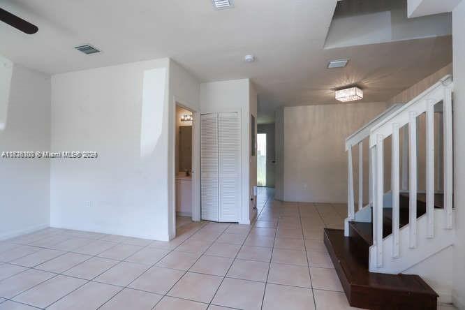 2911 Southeast 15th Road, Unit 65 Homestead, FL 33035 - Photo 3 of 11 a view of a hallway