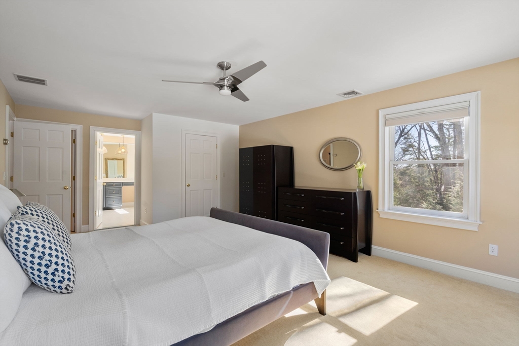 86 Whittier Road Wellesley, MA 02481 - Photo 20 of 39 a bedroom with a bed and a window