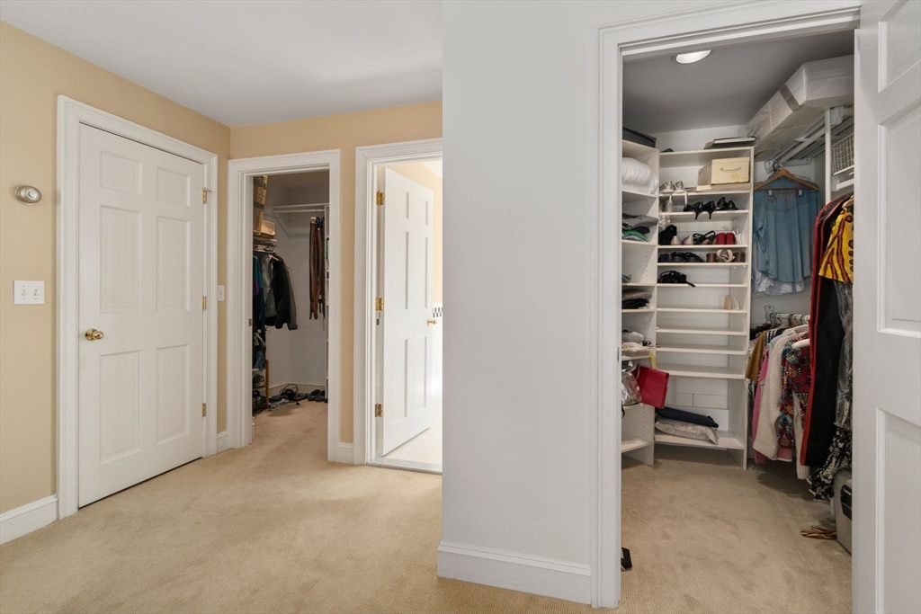86 Whittier Road Wellesley, MA 02481 - Photo 21 of 39 a view of walk in closet with clothes and shoes