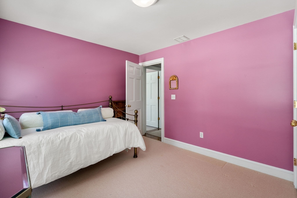 86 Whittier Road Wellesley, MA 02481 - Photo 29 of 39 a bedroom with pink walls and pink rug