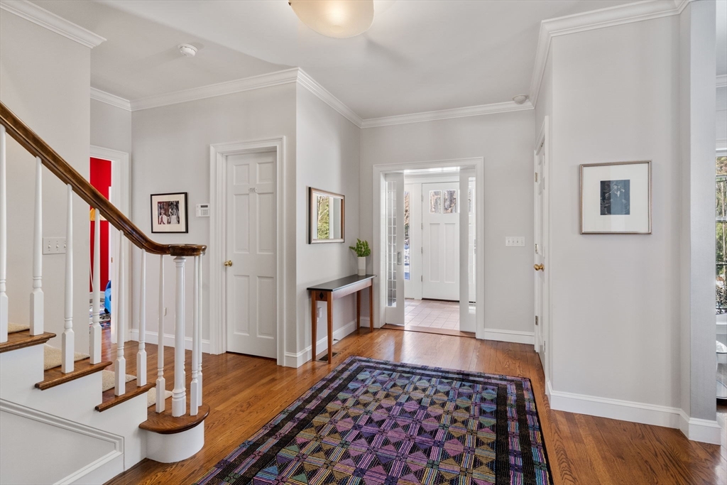 86 Whittier Road Wellesley, MA 02481 - Photo 3 of 39 a view of entryway and hall with wooden floor