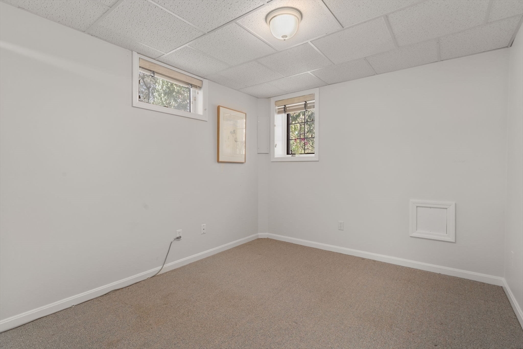 86 Whittier Road Wellesley, MA 02481 - Photo 32 of 39 an empty room with windows