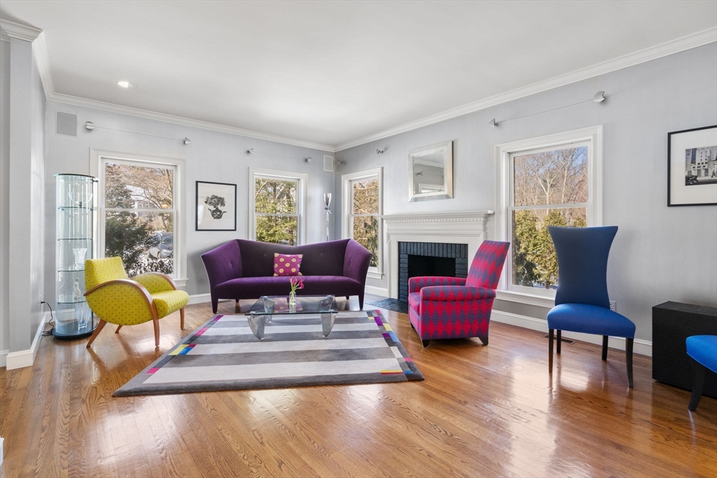 86 Whittier Road Wellesley, MA 02481 - Photo 4 of 39 a living room with furniture and a fireplace