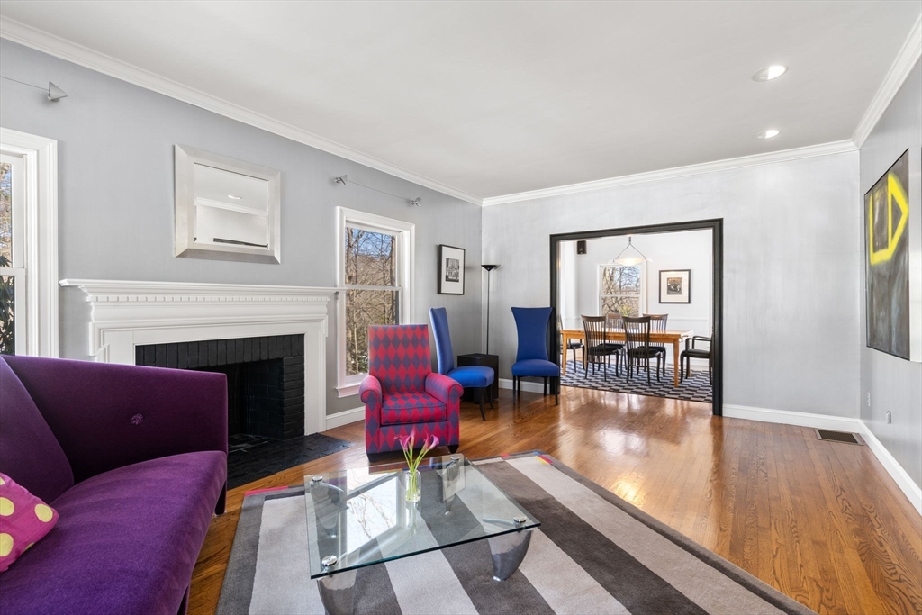 86 Whittier Road Wellesley, MA 02481 - Photo 6 of 39 a living room with furniture and a fireplace