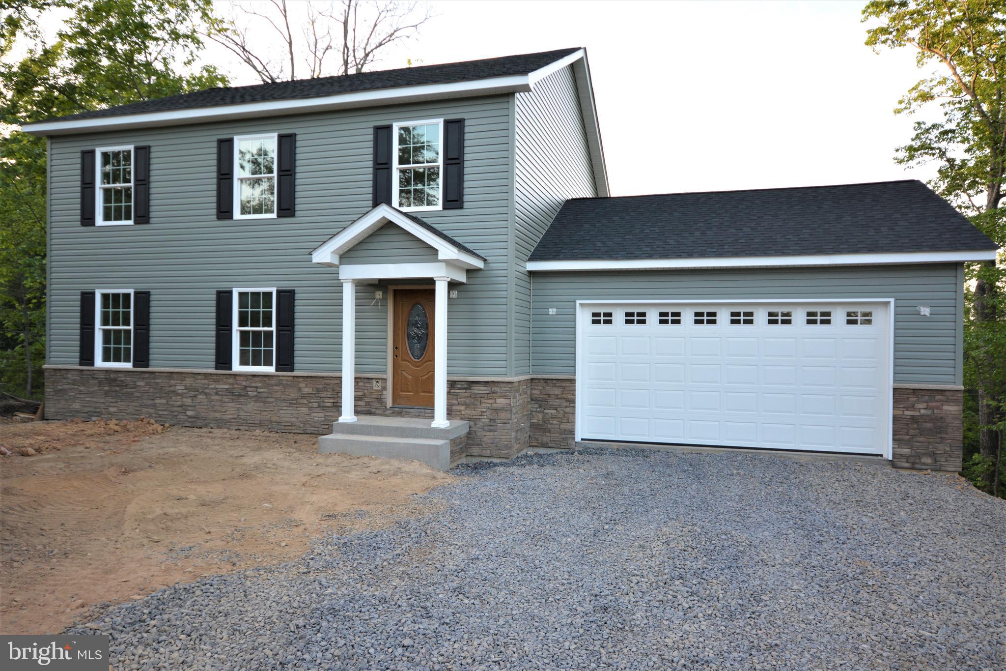 HOME ON STATE MAINTAINED ROAD - NO DIRT ROADS