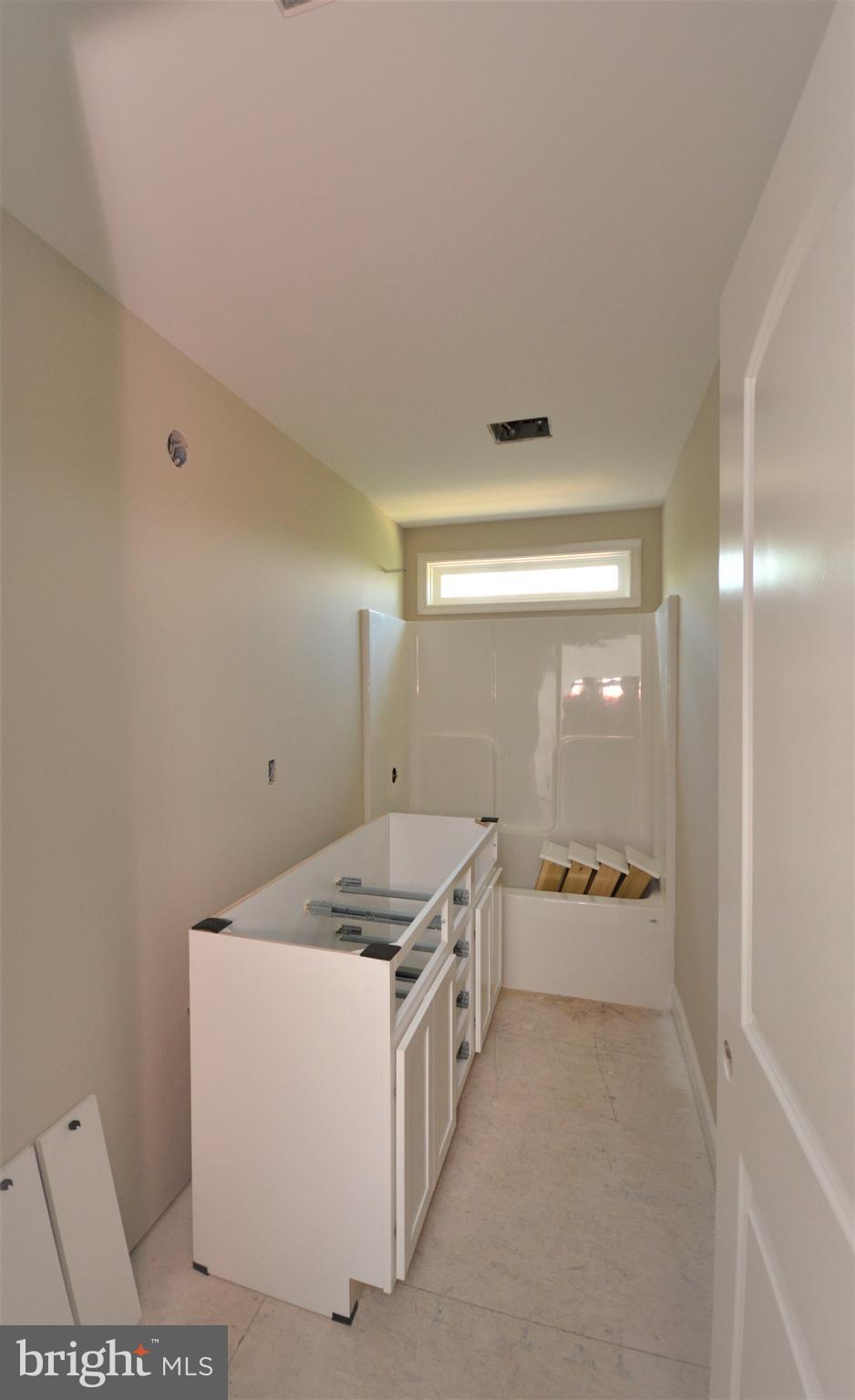 Lower Valley Road Strasburg, VA 22657 - Photo 24 of 37 HALL BATH HAS DOUBLE SINKS AND TILE FLOOR