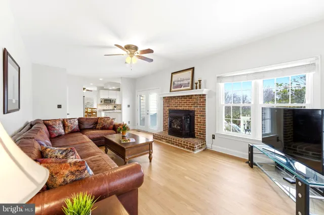 an aerial view of a swimming pool with a mountain