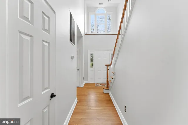 a bed room with a bed and a television