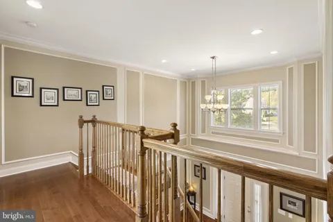 a living room with furniture and windows