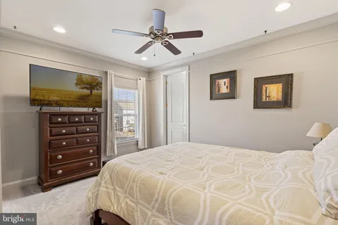 a bathroom with a sink a mirror and shower