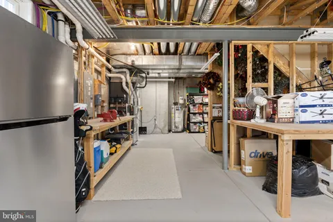 an aerial view of a house with swimming pool