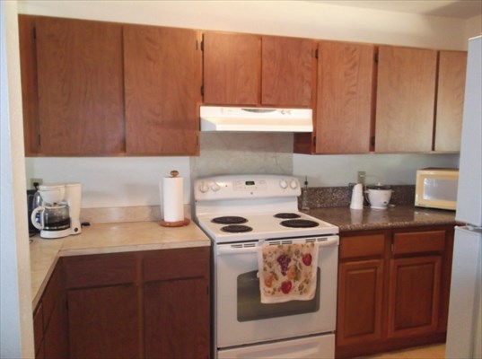 4971 Ea Road Kapaa, HI 96746 - Photo 17 of 25 a kitchen with a stove and a sink