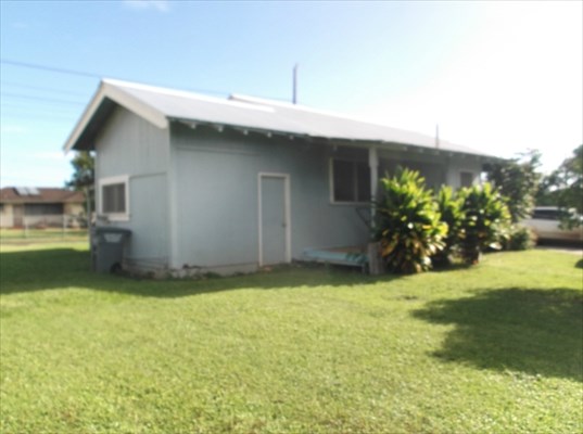 4971 Ea Road Kapaa, HI 96746 - Photo 2 of 25 a backyard of a house with lots of green space
