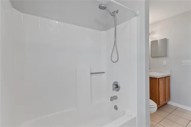 a bathroom with a bath tub