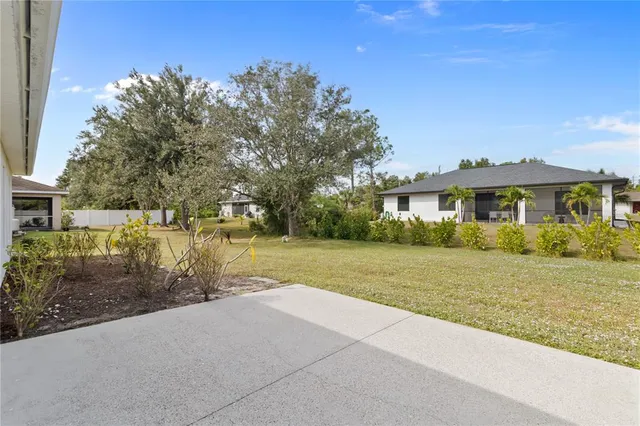 a view of house with outdoor space and street view