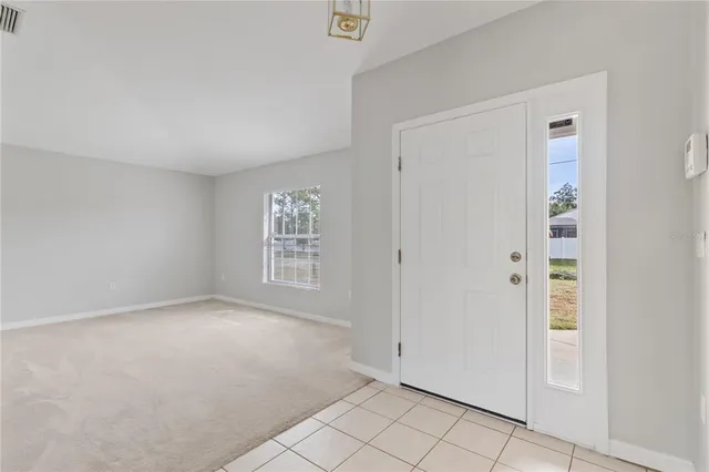 a view of an empty room with window