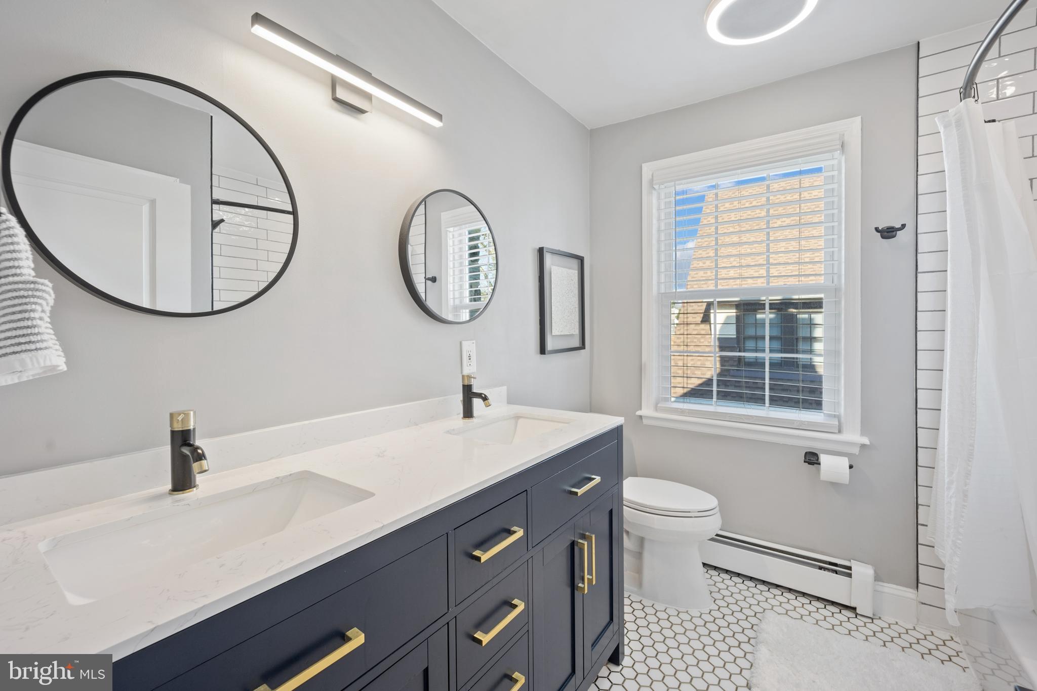 222 Lynbrooke Road Springfield, PA 19064 - Photo 26 of 42 Remodeled Hall Bathroom With Tub/Shower