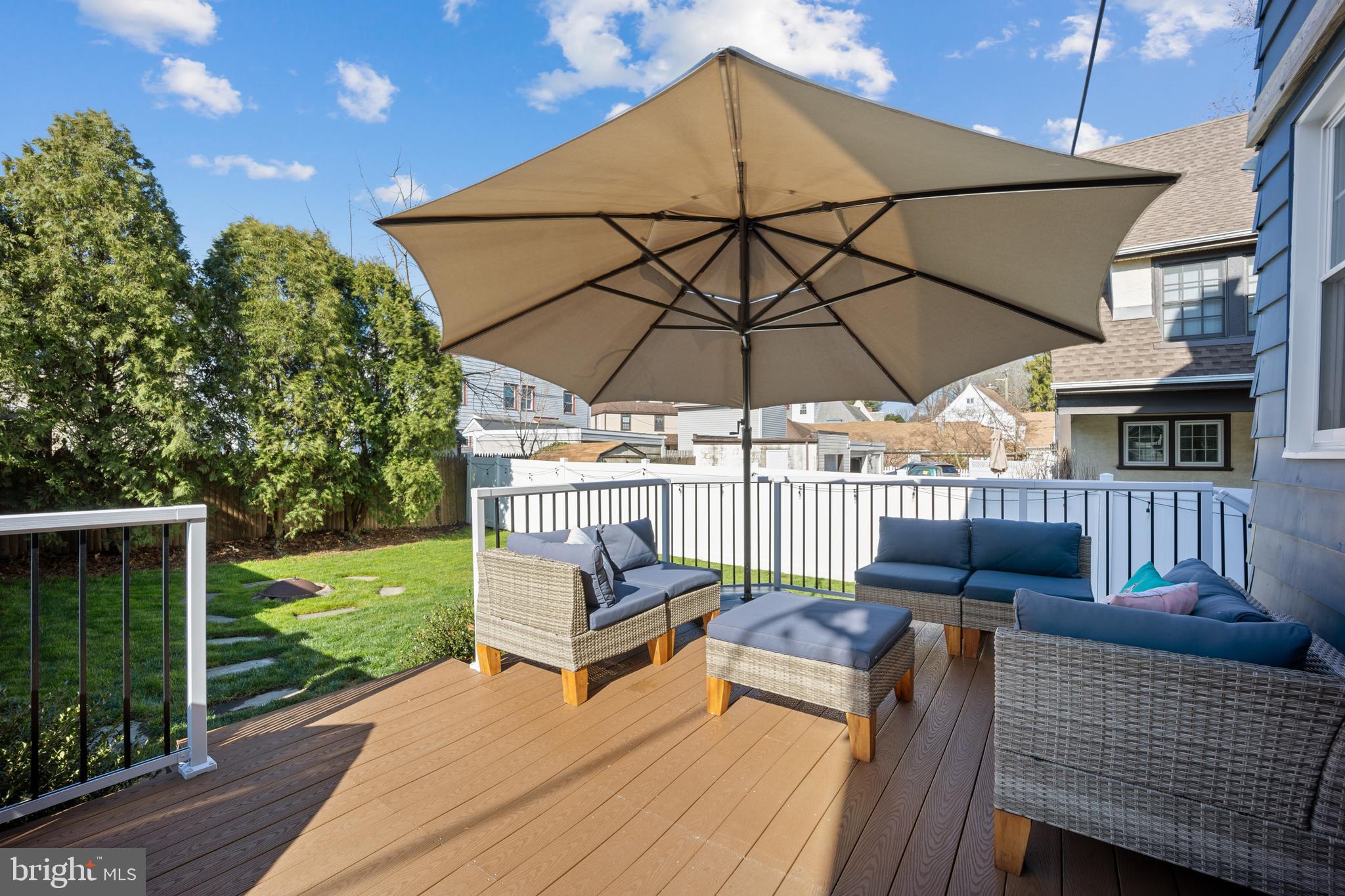 222 Lynbrooke Road Springfield, PA 19064 - Photo 35 of 42 Relax On The Rear M/F Deck And Private Fenced Yard