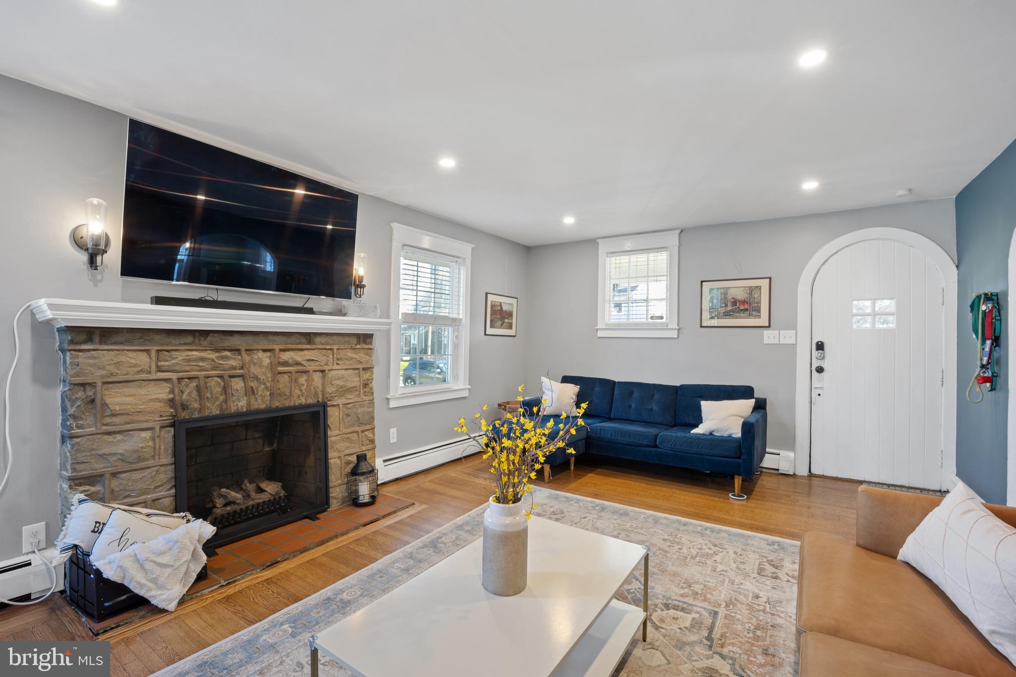 222 Lynbrooke Road Springfield, PA 19064 - Photo 6 of 42 Living Room Featuring Stone Gas Fireplace