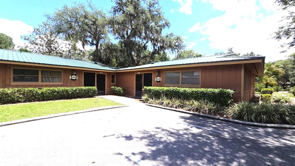 454 Cottage Circle, Unit 454 River Ranch, FL 33867 - Photo 2 of 27 a view of a house with a patio