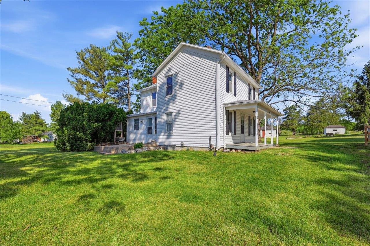 5096 Battlefield Road Harrisonburg, VA 22801 - Photo 5 of 38 a front view of a house with a garden