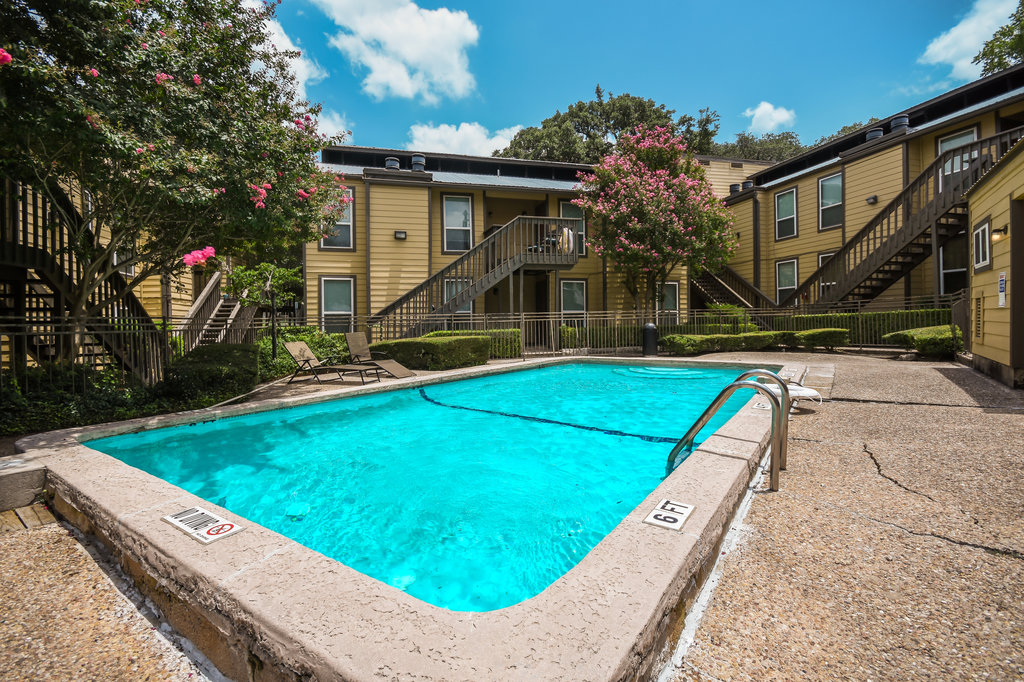 1000 West 26th Street, Unit 102 Austin, TX 78705 - Photo 20 of 23 a view of a house with pool