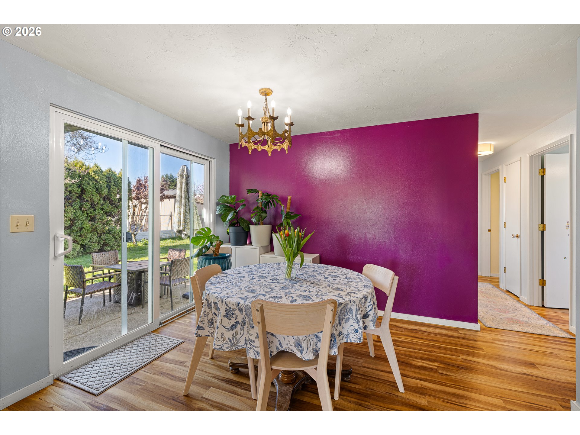 992 Candlelight Drive Eugene, OR 97402 - Photo 13 of 35 a view of a dining room with furniture and wooden floor