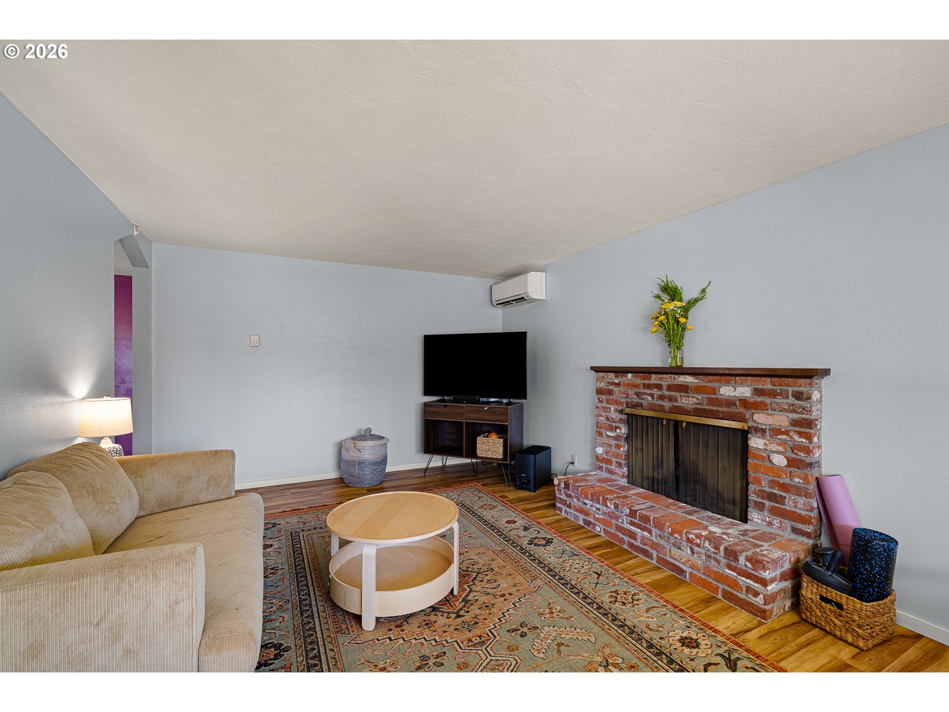 992 Candlelight Drive Eugene, OR 97402 - Photo 17 of 35 a living room with furniture and a fireplace