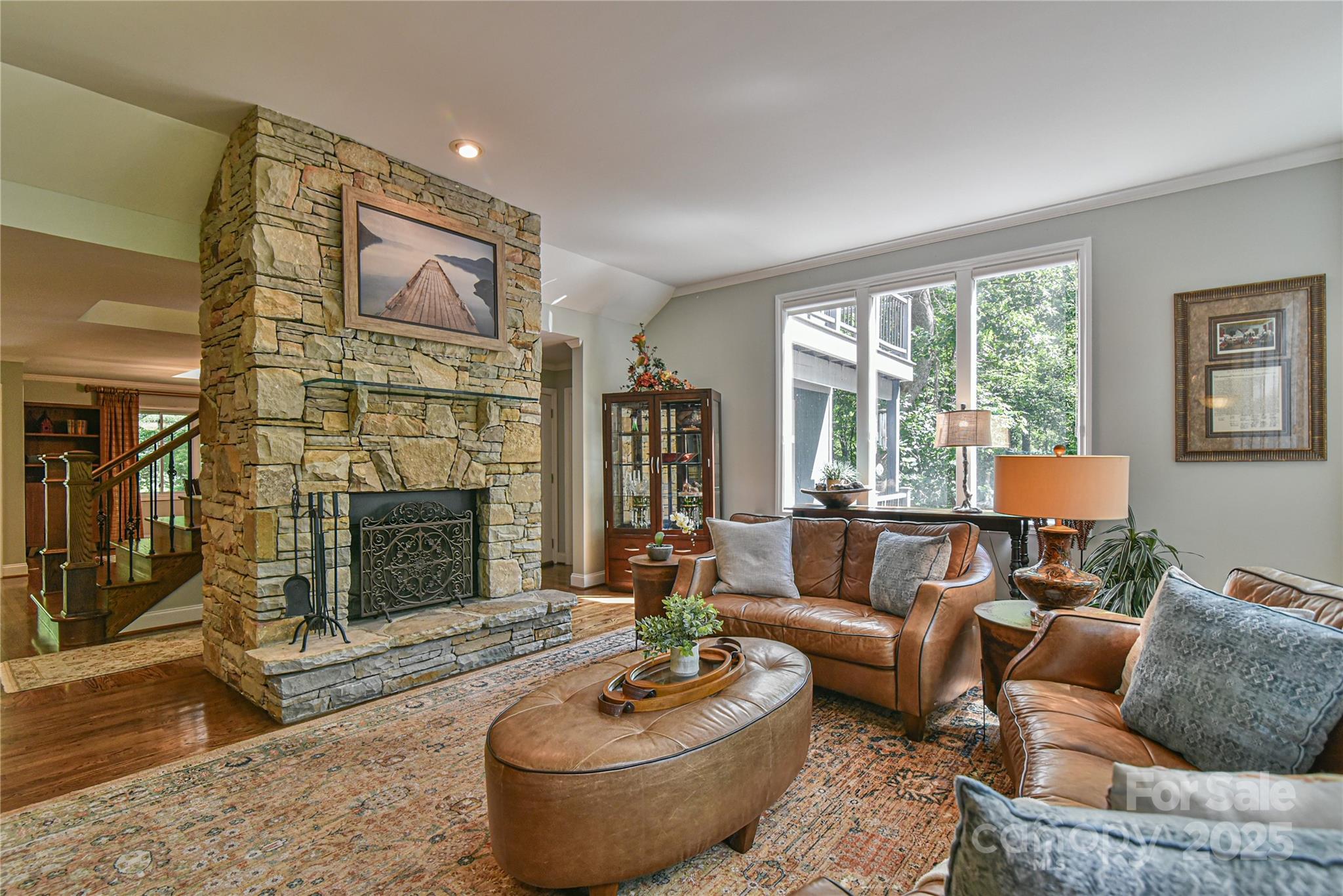 409 North Fork Road Black Mountain, NC 28711 - Photo 12 of 48 a living room with furniture and a fireplace