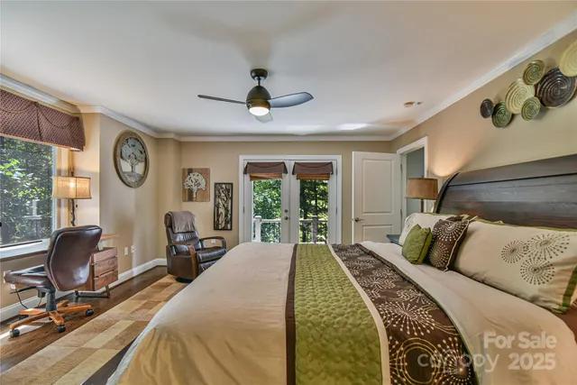 a bed room with a bed and a chair